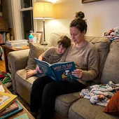 A mother reading with her child